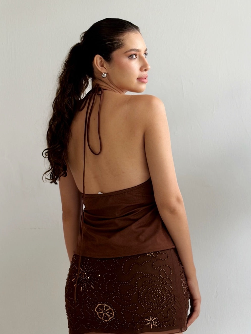 Top peplum con tirantes