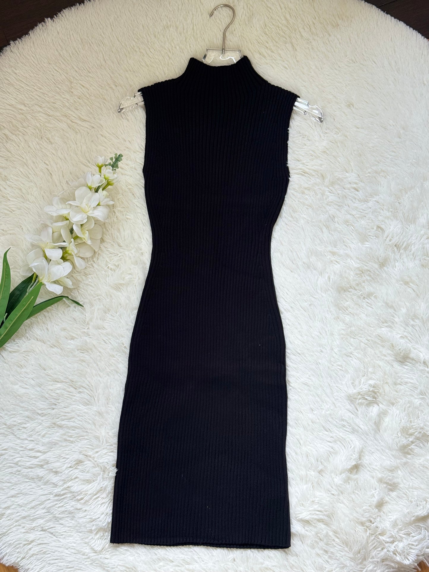 Vestido tejido cuello alto sin mangas