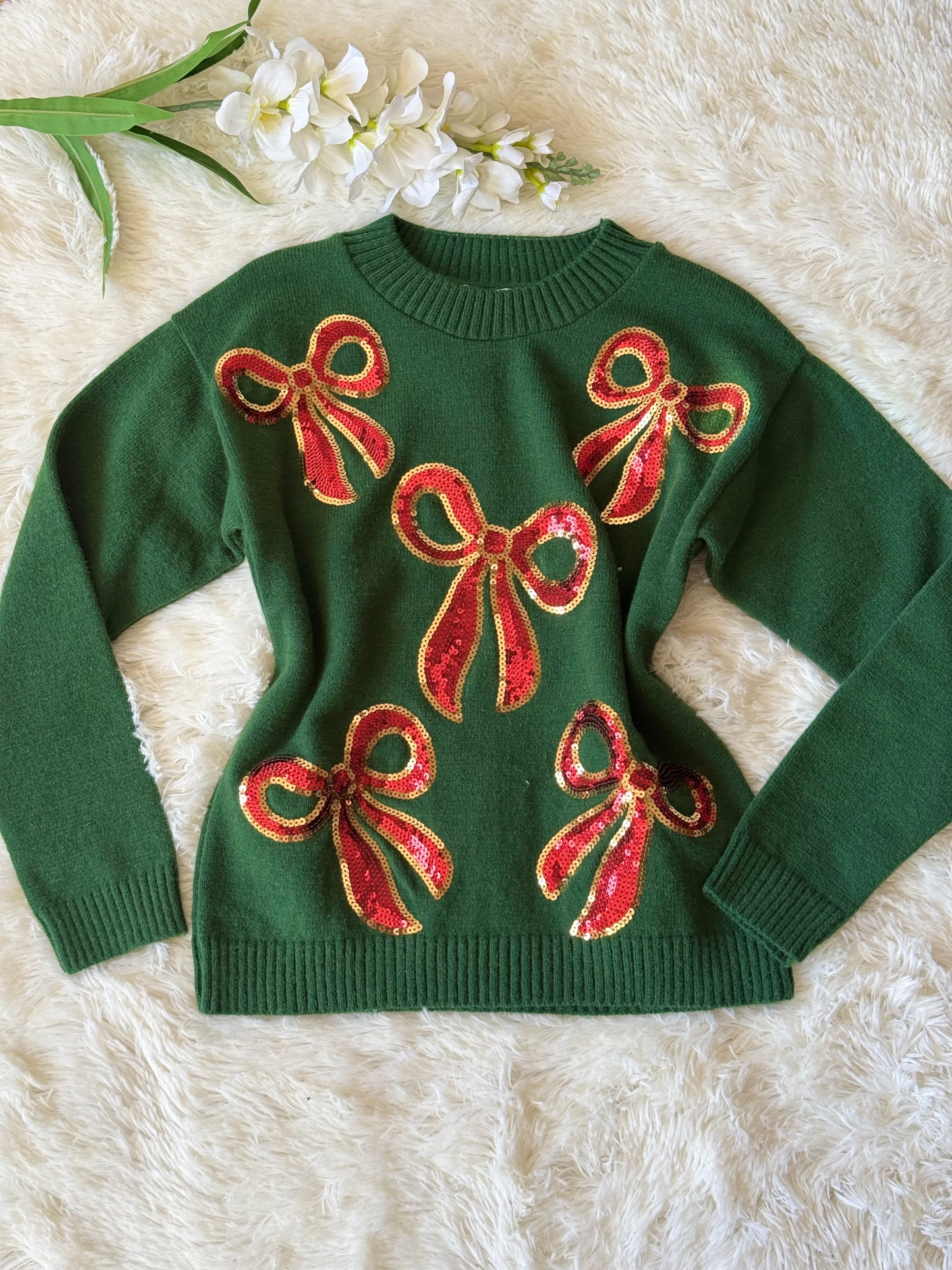 Suéter moños navideño