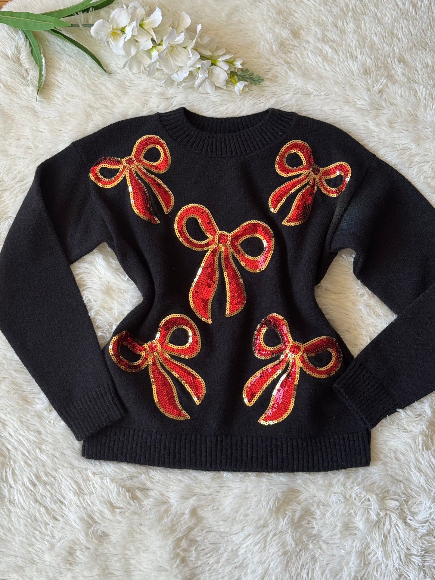 Suéter moños navideño