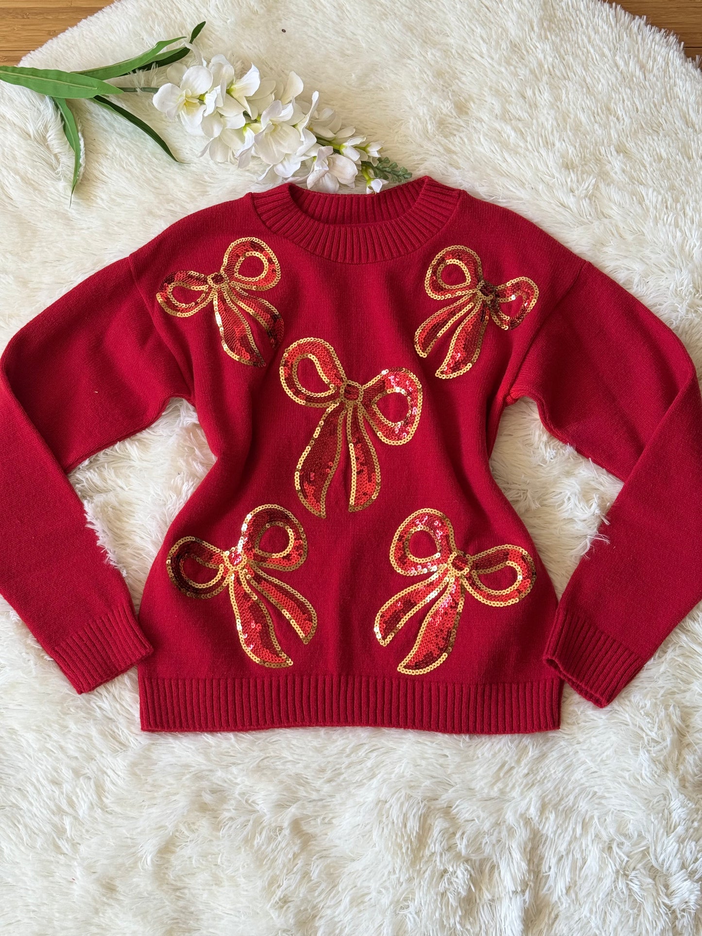 Suéter moños navideño