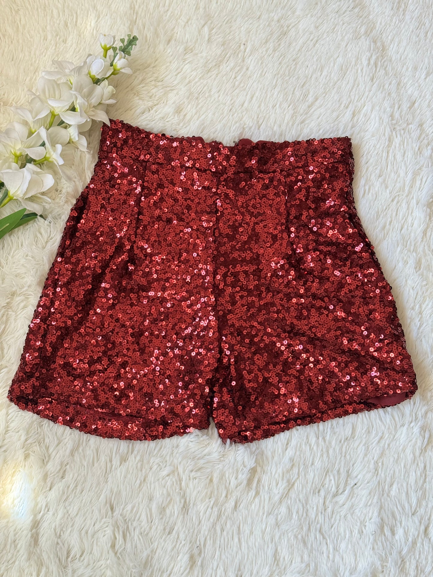 Short con lentejuelas y forro