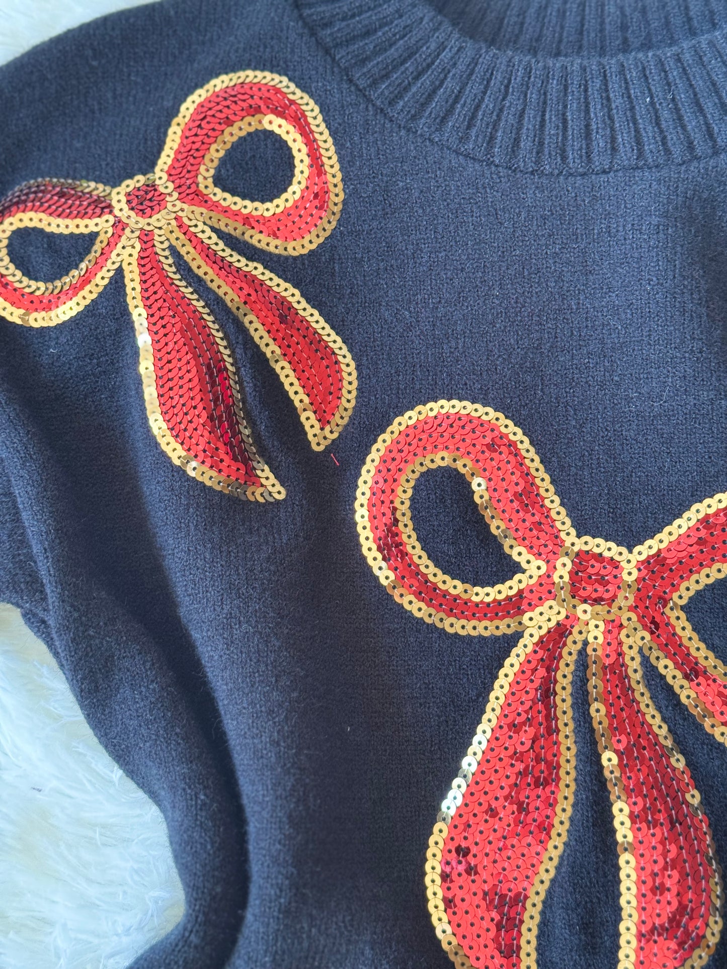 Suéter moños navideño