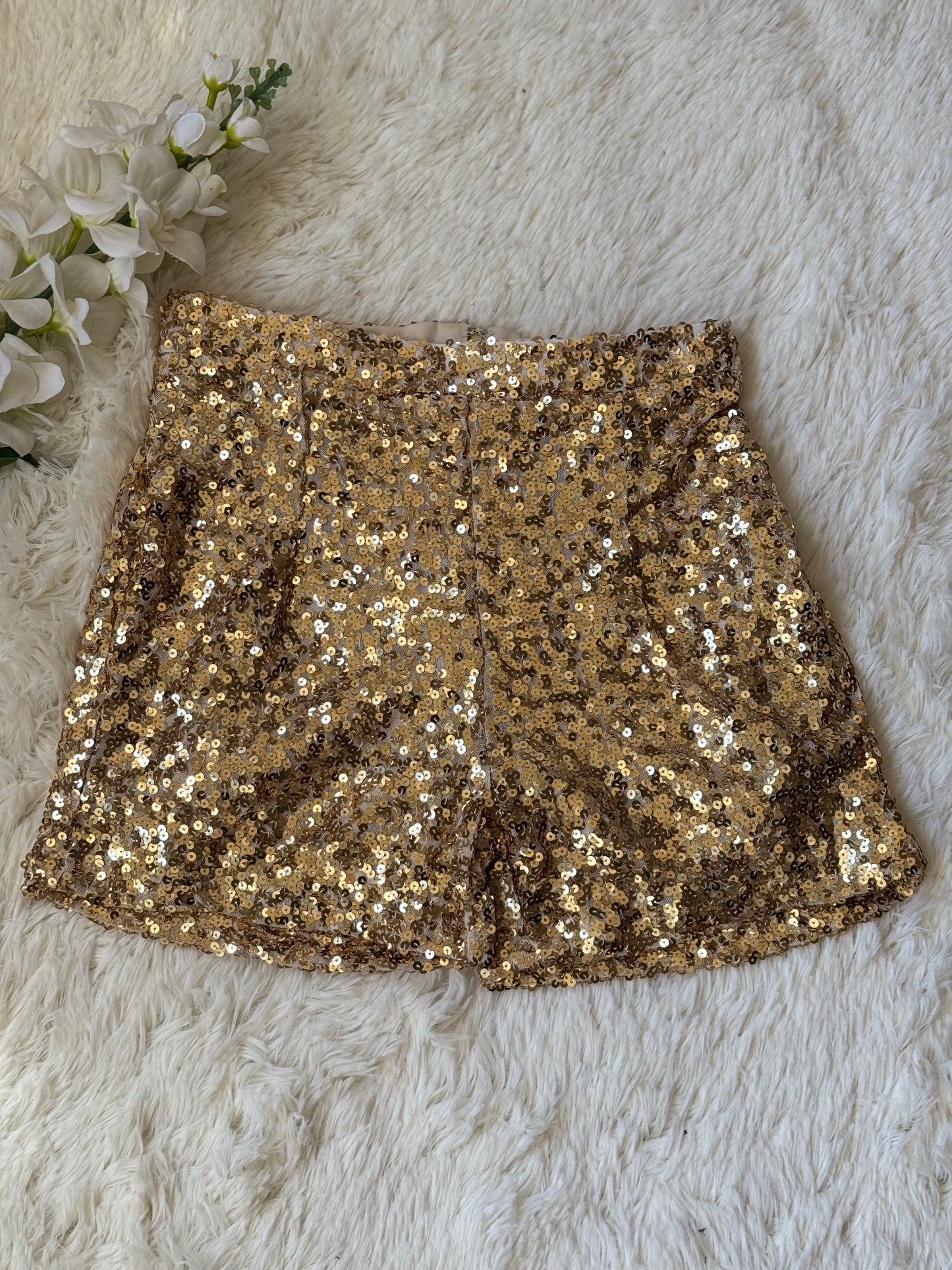 Short con lentejuelas y forro
