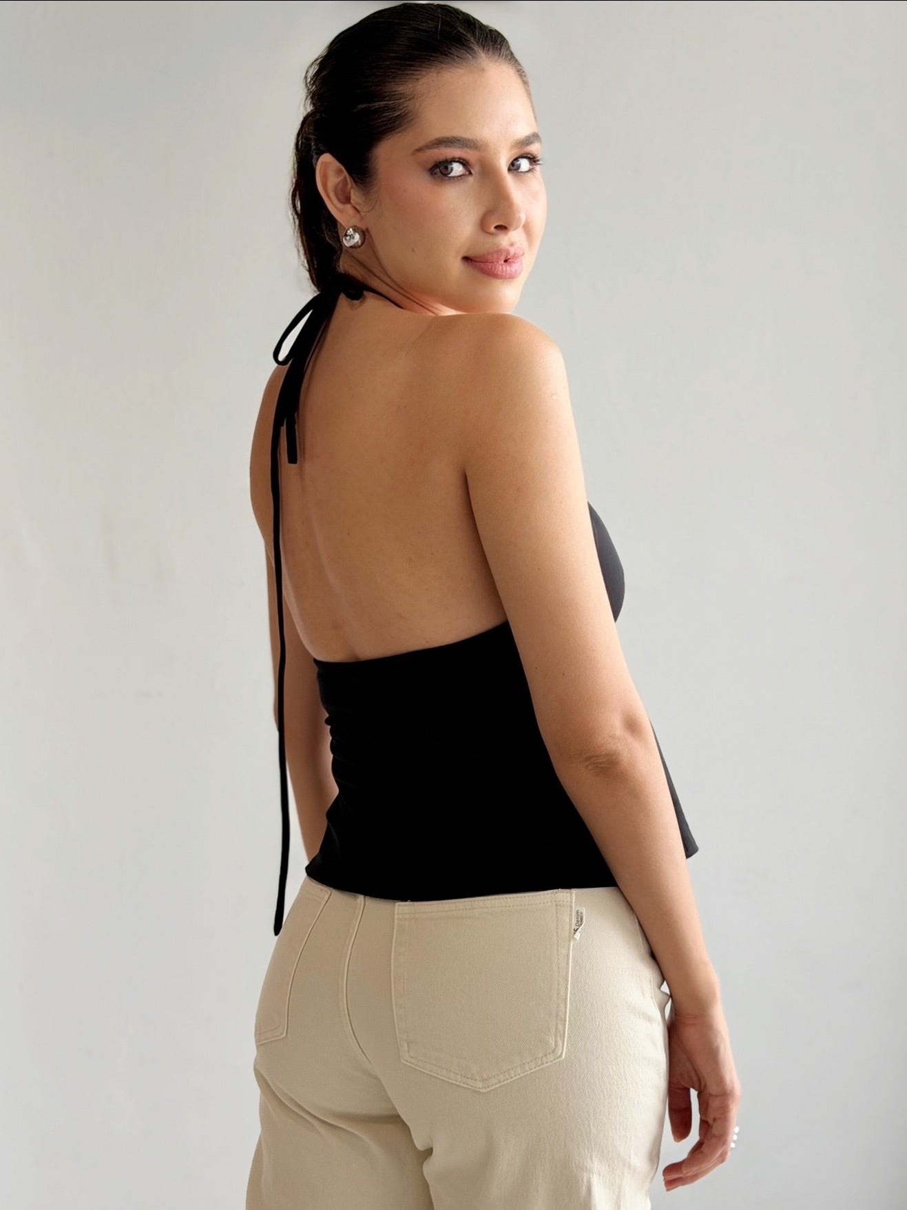 Top peplum con tirantes