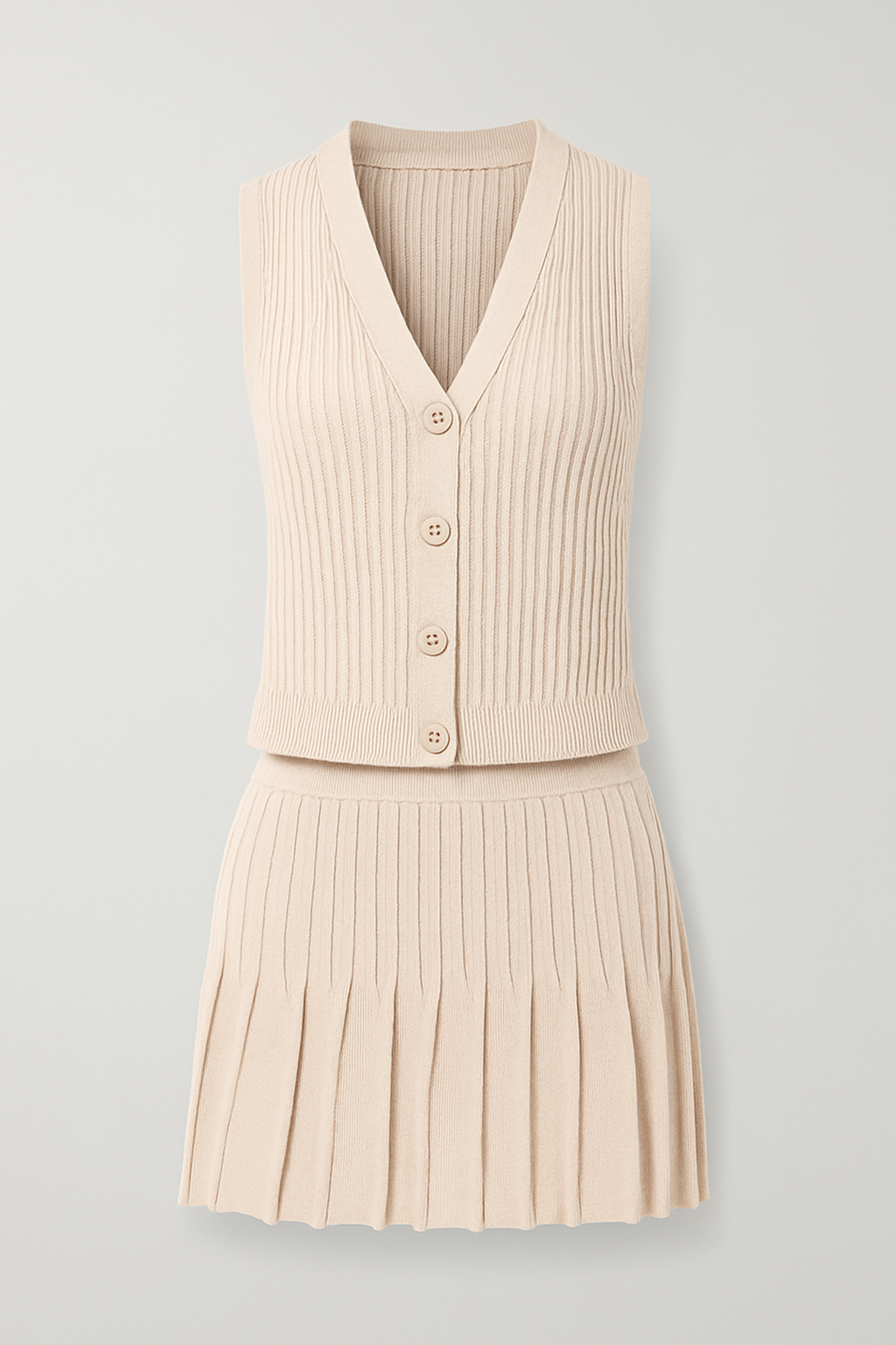 Conjunto de falda tableada y chaleco tejido